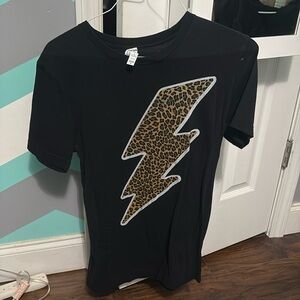 Black cheetah print lighting bolt tee shirt for sale.